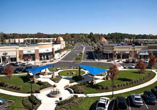 Exterior view of a shopping center nearby Warrington Crossings apartments for rent in Warrington, PA